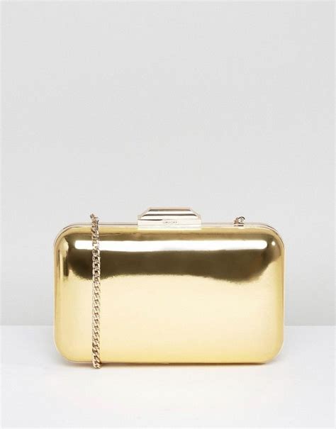 dune broncho gold metallic box clutch bag|dune london gold clutch purse.